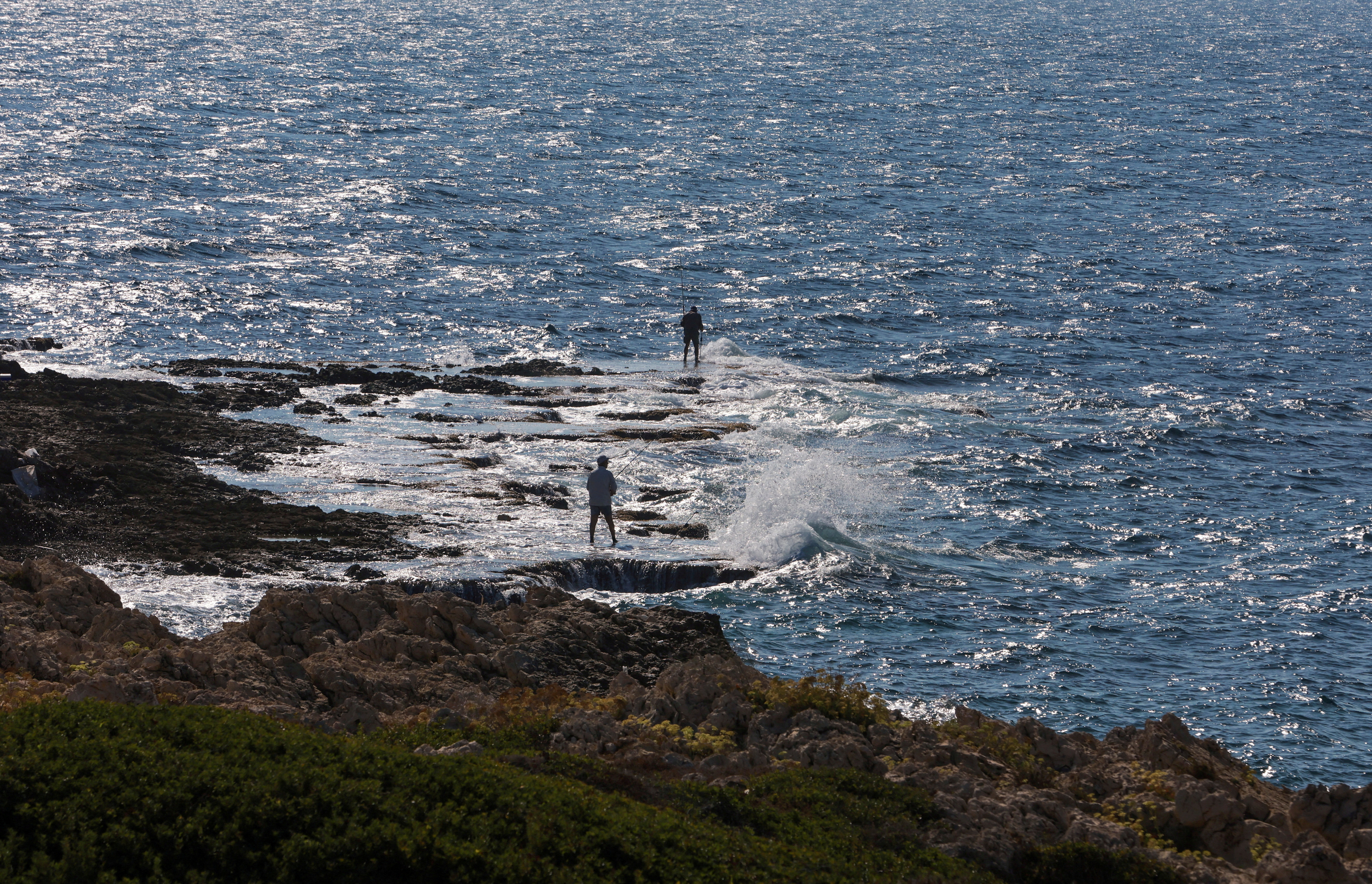 Fishermen catch fish in Naqoura
