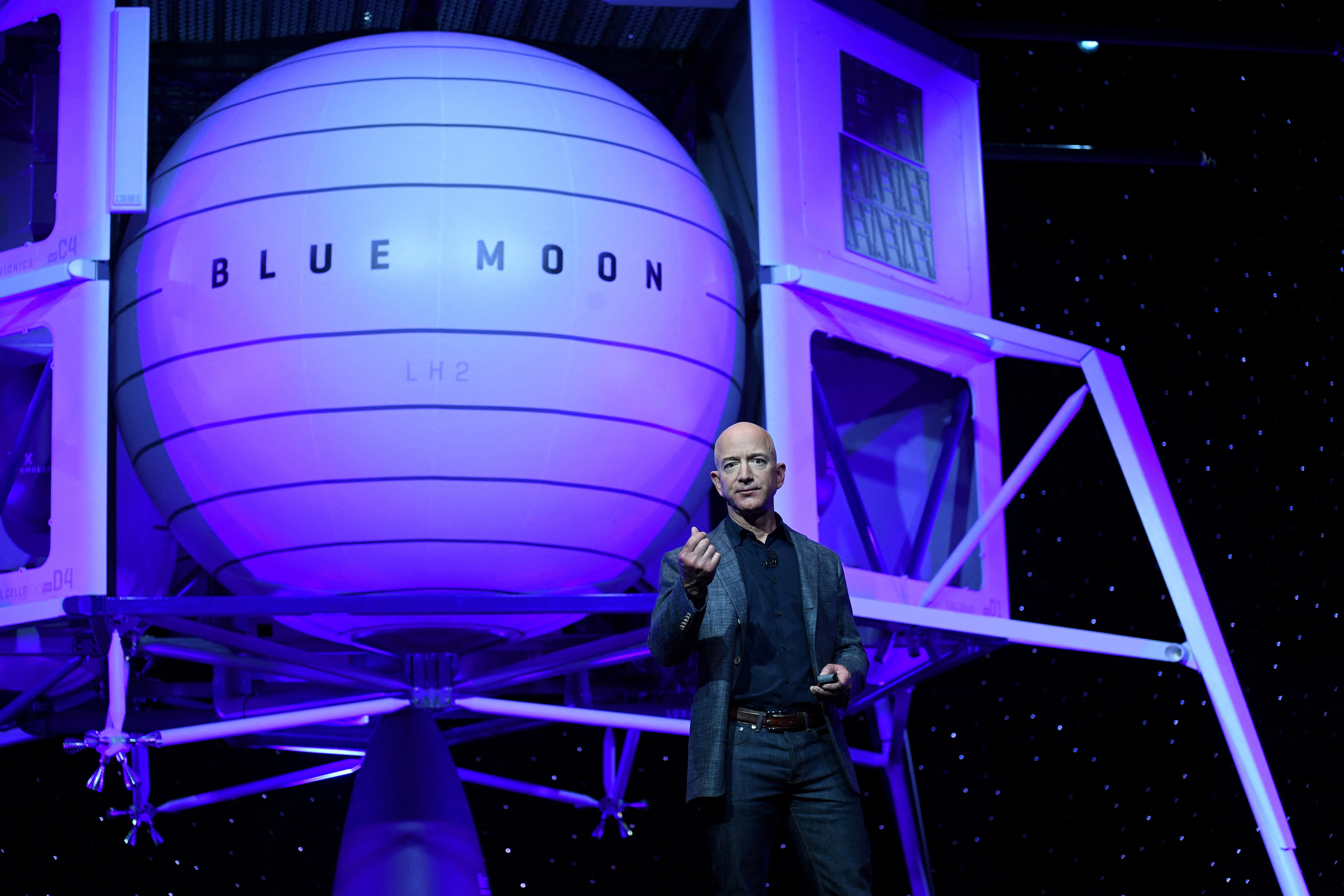 Founder, Chairman, CEO and President of Amazon Jeff Bezos unveils his space company Blue Origin's space exploration lunar lander rocket called Blue Moon during an unveiling event in Washington