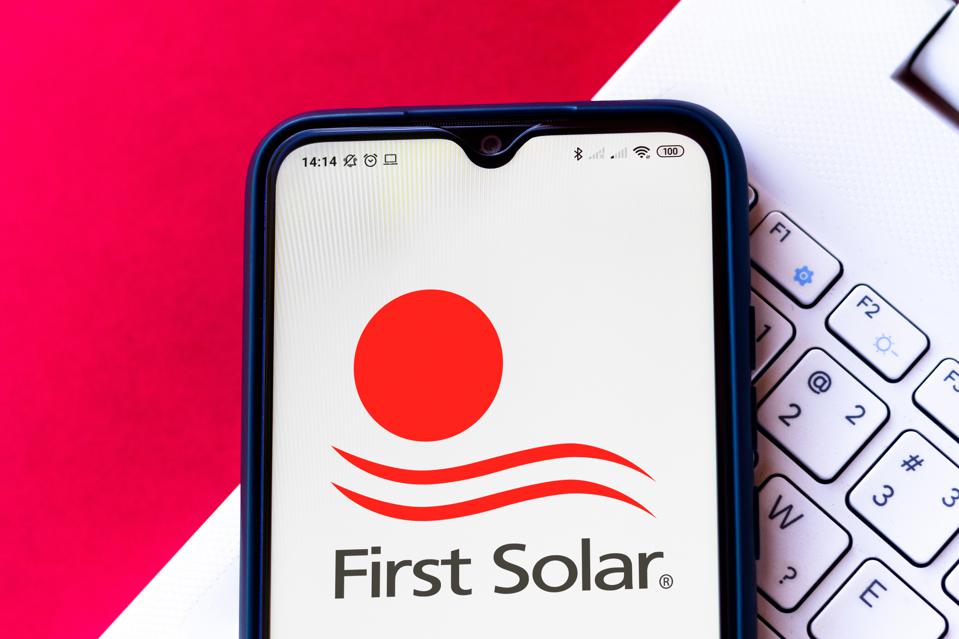 In this photo illustration the First Solar logo seen...