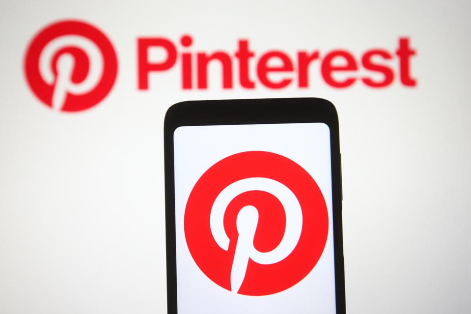 In this photo illustration the Pinterest logo of a US image...